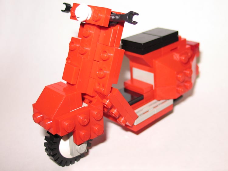 http://www.brickshelf.com/gallery/cre8ivejuan/LEGO-Vespa-Scooter/lego-vespa-scooter-02.jpg