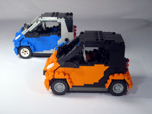 The orange car was easier to build than the blue one because it is only two